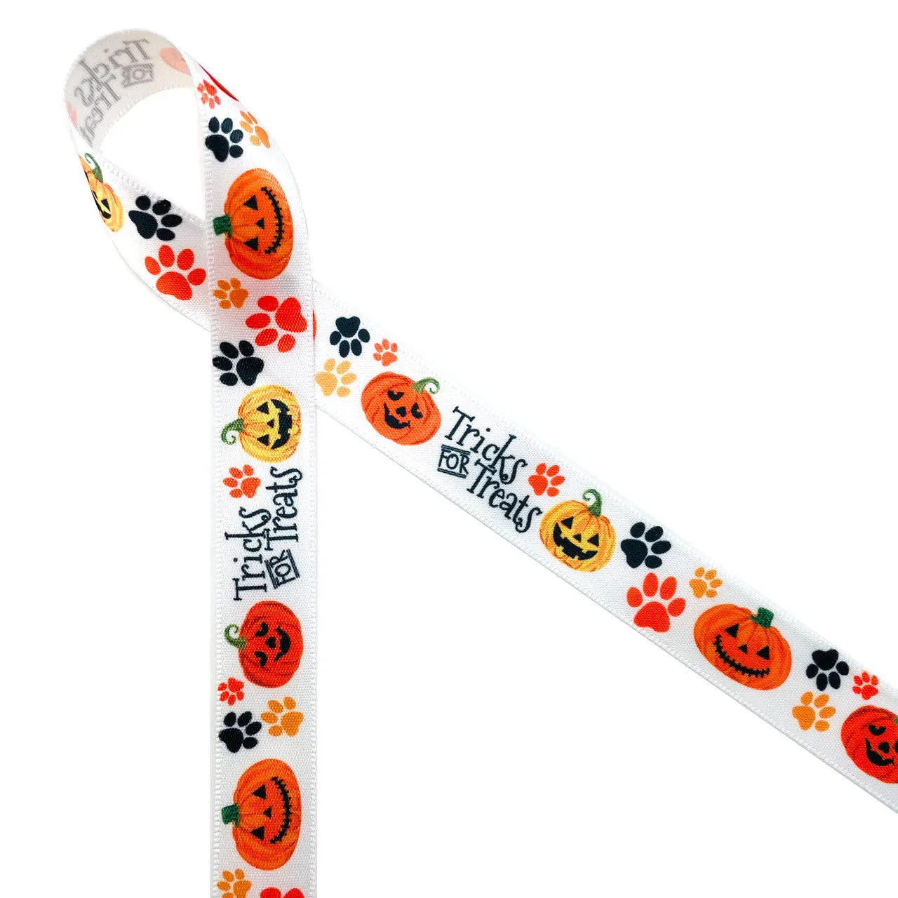 Tricks for Treats ribbon with paw prints and Jack O' Lanterns for pets printed  on 5/8" white single face satin